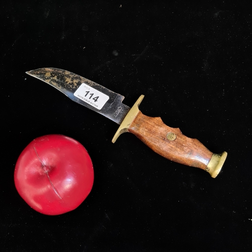 114 - A vintage wooden handled dagger knife with brass mounts and guard, marked stainless Steel.
Length: a... 