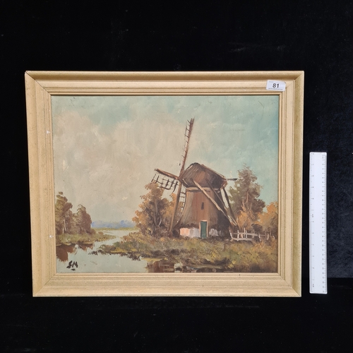 81 - A late 19th century Dutch school oil on canvas painting. Features a windmill landscape. Rendered in ... 