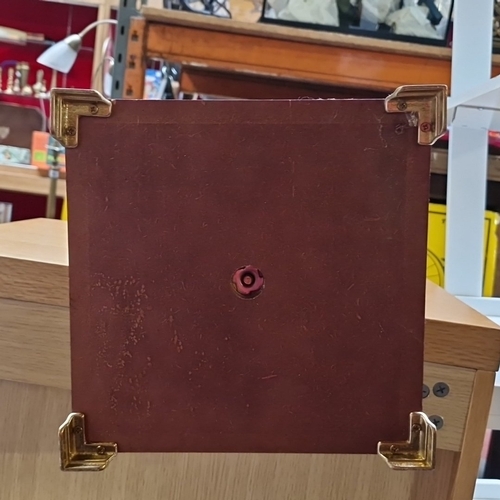 426 - A square-top mahogany pedestal flower pot stand, the moulded top on a fluted column and stepped squa... 