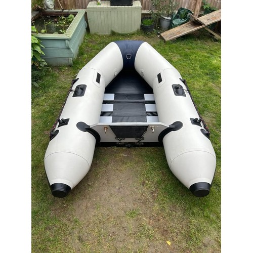 A YAM inflatables tender, model 230T, in blue and grey PVC with slatted ...