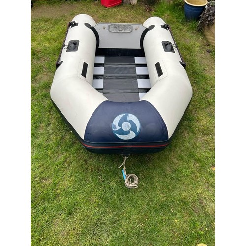 A YAM inflatables tender, model 230T, in blue and grey PVC with slatted ...