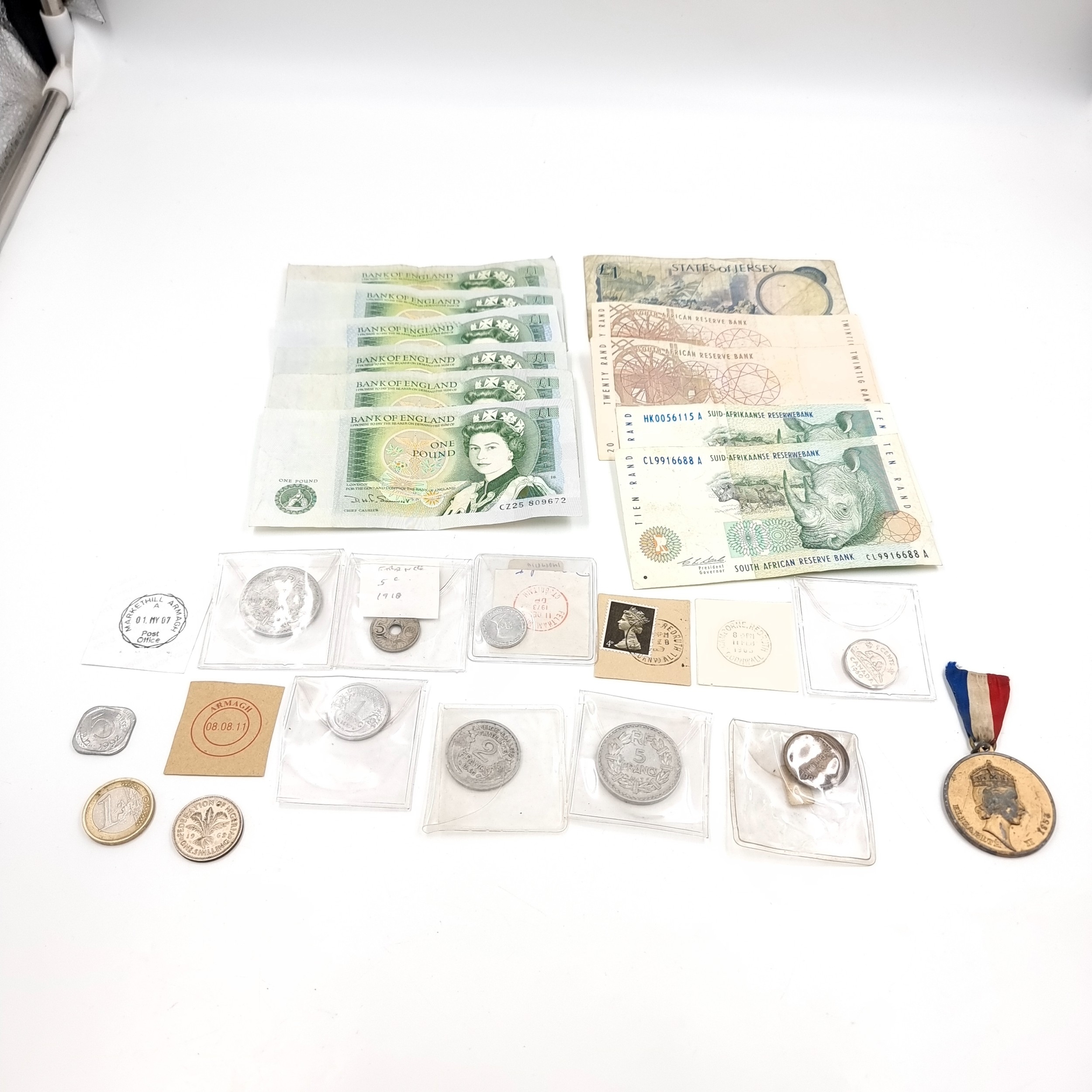 A collection of assorted paper bank notes. Lot includes Six UK one ...
