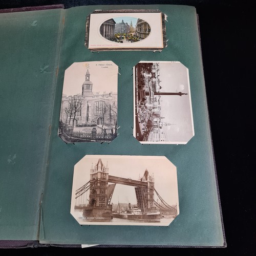 102 - Star Lot : A large postcard album holding a large array of vintage and antique postcards. Lot includ... 