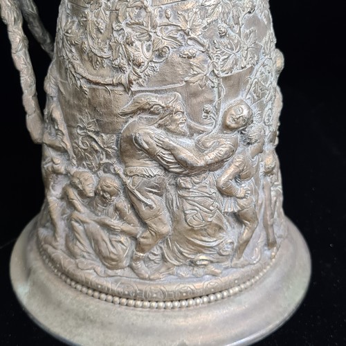 116 - Star Lot : A stunning antique 'J.G And Sons' silver plated jug. Piece holds elaborate and intricate ... 