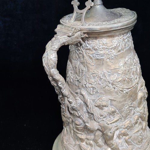 116 - Star Lot : A stunning antique 'J.G And Sons' silver plated jug. Piece holds elaborate and intricate ... 