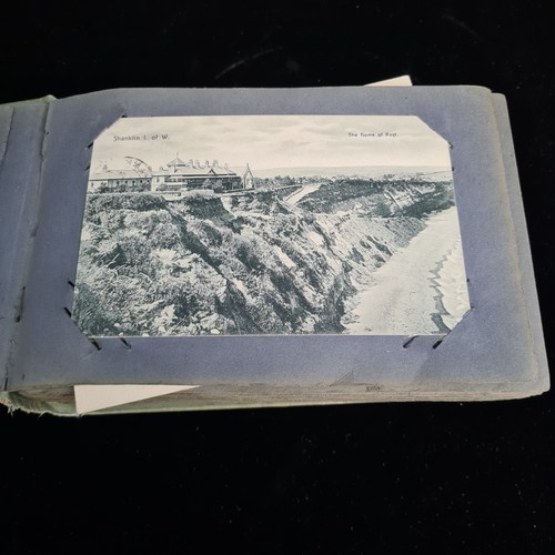 120 - A postcard album containing 100+ UK and Irish postcards. Examples  the 1920's - 40's  with hand writ... 