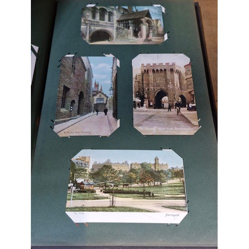 102 - Star Lot : A large postcard album holding a large array of vintage and antique postcards. Lot includ... 