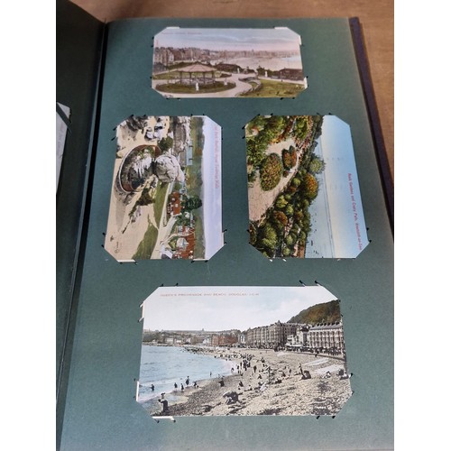 102 - Star Lot : A large postcard album holding a large array of vintage and antique postcards. Lot includ... 