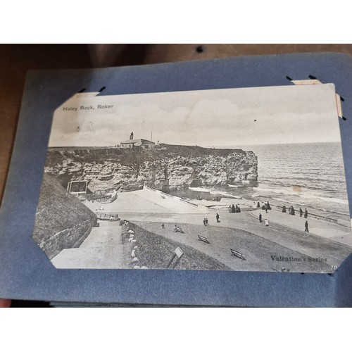 120 - A postcard album containing 100+ UK and Irish postcards. Examples  the 1920's - 40's  with hand writ... 