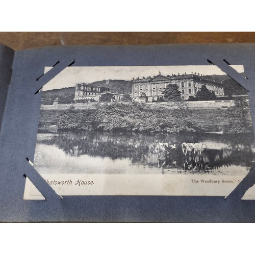 120 - A postcard album containing 100+ UK and Irish postcards. Examples  the 1920's - 40's  with hand writ... 