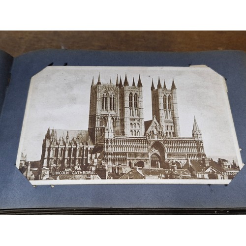 120 - A postcard album containing 100+ UK and Irish postcards. Examples  the 1920's - 40's  with hand writ... 