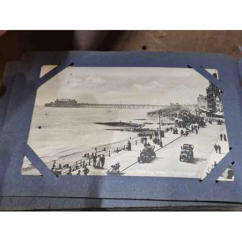 120 - A postcard album containing 100+ UK and Irish postcards. Examples  the 1920's - 40's  with hand writ... 