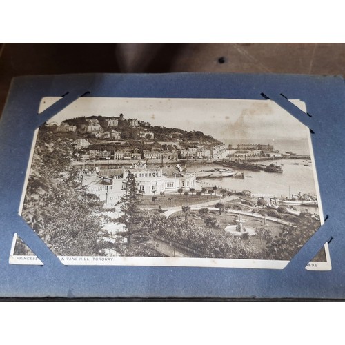 120 - A postcard album containing 100+ UK and Irish postcards. Examples  the 1920's - 40's  with hand writ... 