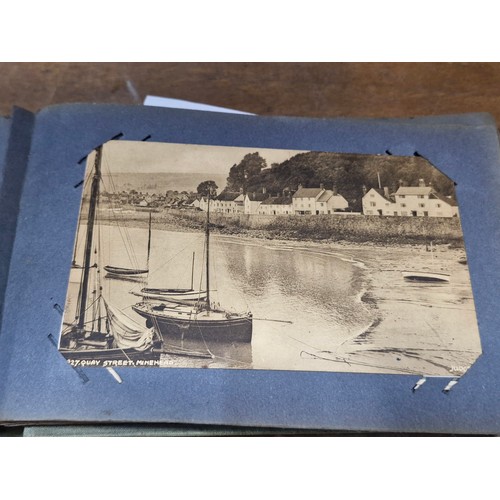 120 - A postcard album containing 100+ UK and Irish postcards. Examples  the 1920's - 40's  with hand writ... 