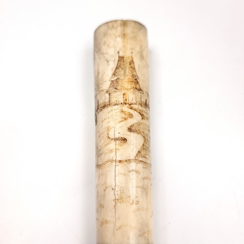 Star Lot: A stunning 19th century Japanese scrimshaw baton. Beautifully ...