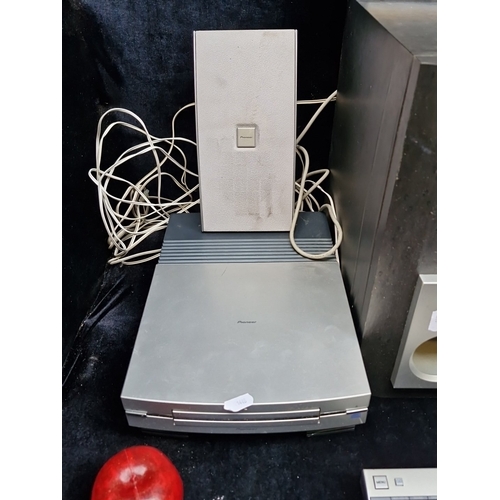 401 - A good surround sound Pioneer silver-finished system, comprising a subwoofer, separate media players... 