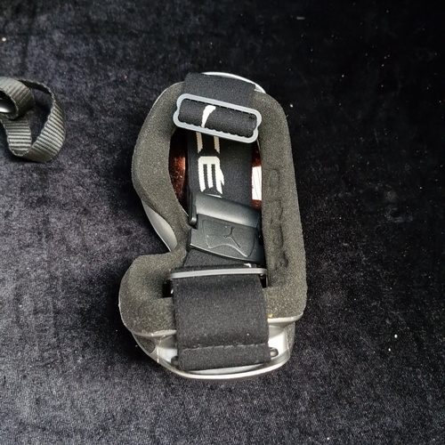 403 - 2 CEBE winter sports items comprising a silver-tone ski/snowboard helmet with padded ear flaps and a... 