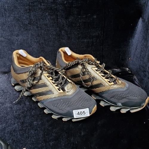 405 - A group of assorted footwear, comprising Nike Flyknit running shoes, Nike knit trainers, Adidas trai... 