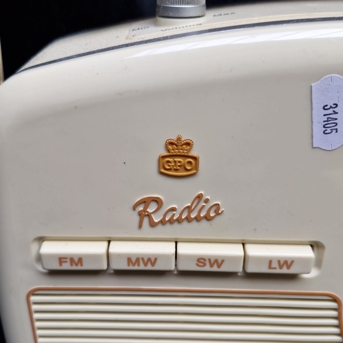 408 - A group of domestic electronics, comprising a GPO Radio portable multi-band set with carry handle, a... 