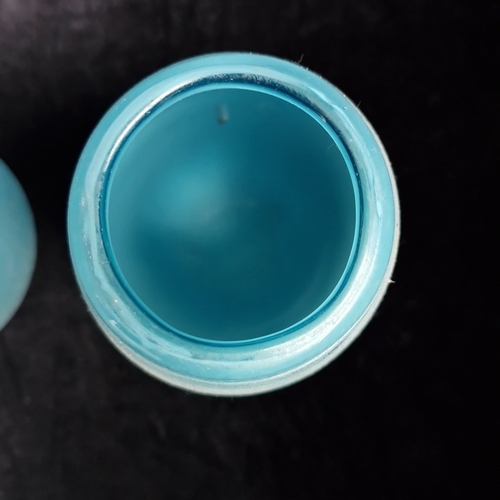 409 - 2 frosted turquoise glass vases, of teardrop form with slightly everted rims, each bearing a paper l... 