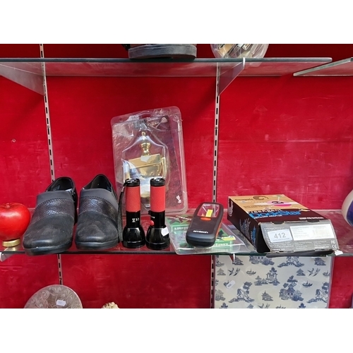 412 - A group of assorted items including a pair of black slip-on shoes, 2 hand torches, a Seagate FreeAge... 