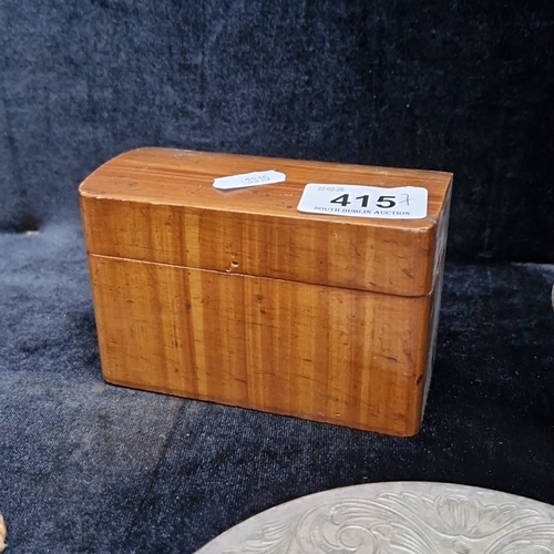 415 - A group of assorted decorative items, including an engraved circular metal salver, a small pewter mu... 