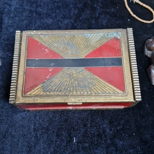 415 - A group of assorted decorative items, including an engraved circular metal salver, a small pewter mu... 