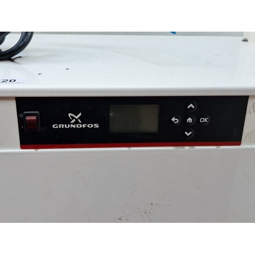 420 - A Grundfos floor-standing pump control unit or pressurisation module, in a white metal housing with ... 