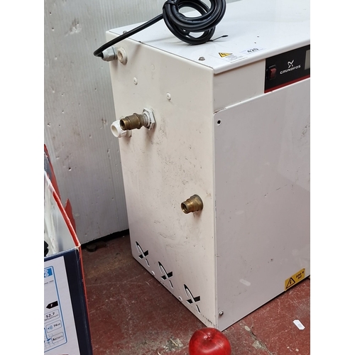 420 - A Grundfos floor-standing pump control unit or pressurisation module, in a white metal housing with ... 