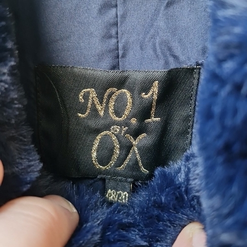 424 - A new with tags navy faux-fur coat by No.1 OX, with stand collar, full-length zip fastening, long sl... 
