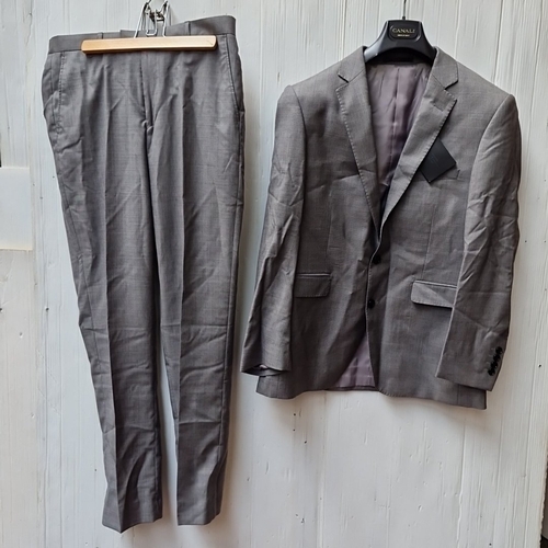 435 - A matched pair of grey tailored trousers and a single-breasted jacket, in fine Italian suiting cloth... 