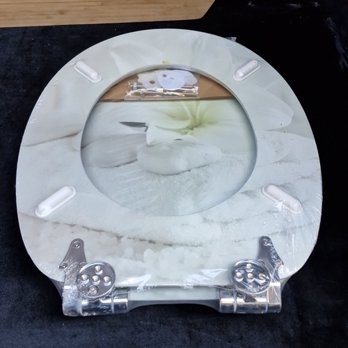 438 - A group of household items including a Cook by Kelvin Haguire bamboo serving board, a Finland souven... 