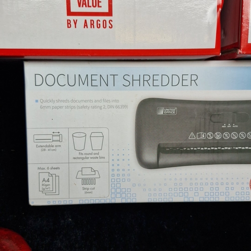 444 - A group of boxed office appliances, comprising Argos “Simple Value” table fans and a United Office d... 