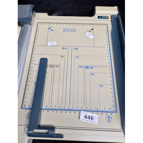 446 - A group of office equipment comprising a United Office paper trimmer with ruled cutting bed and leve... 