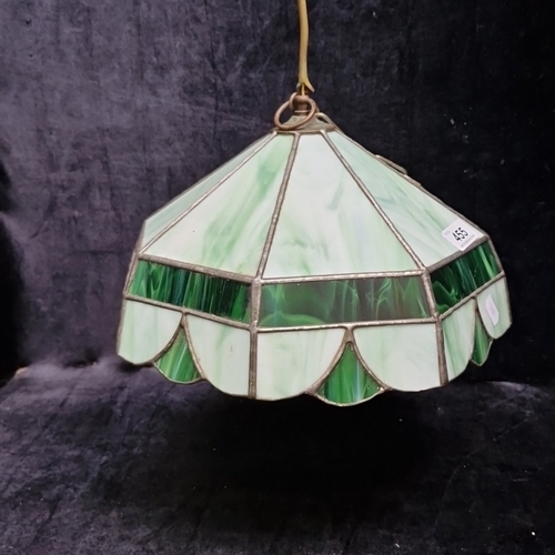 455 - A stained-glass pendant light shade of octagonal form with scalloped edge, in opalescent pale green ... 