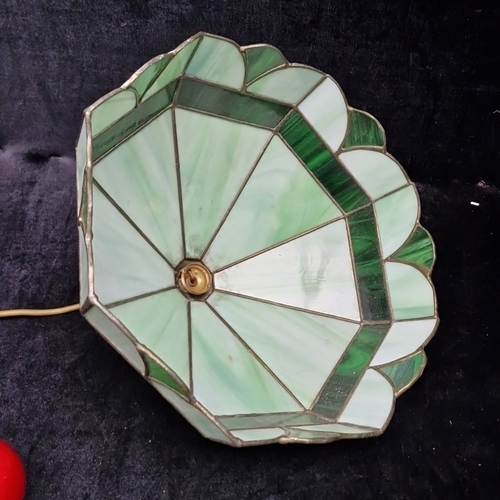 455 - A stained-glass pendant light shade of octagonal form with scalloped edge, in opalescent pale green ... 
