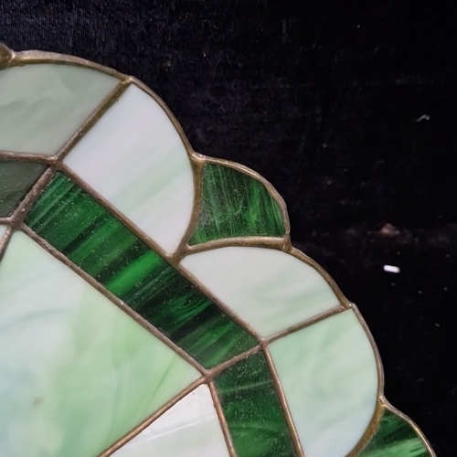 455 - A stained-glass pendant light shade of octagonal form with scalloped edge, in opalescent pale green ... 