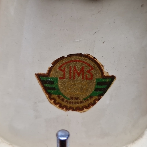 459 - A very clean cream Union electric sewing machine in cream enamelled metal, housed in a wooden carry ... 