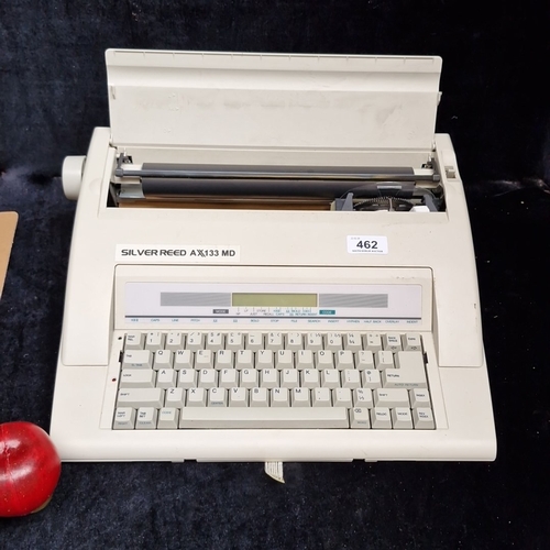 462 - A Silver Reed AX-133 MD electronic typewriter, cream plastic case with QWERTY keyboard, LCD display ... 
