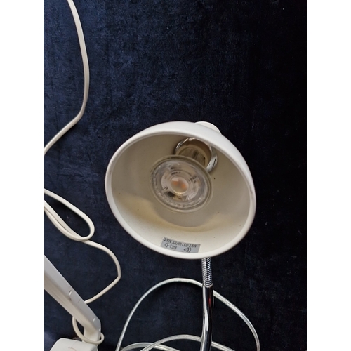 464 - A group of electric lights, including a red enamelled gooseneck desk lamp, 2 white adjustable reflec... 