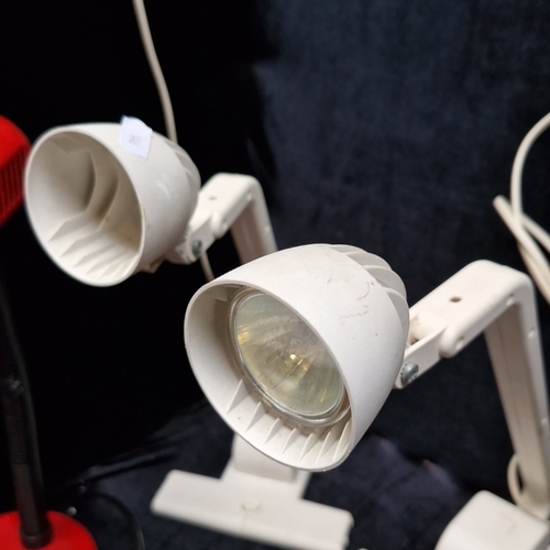 464 - A group of electric lights, including a red enamelled gooseneck desk lamp, 2 white adjustable reflec... 