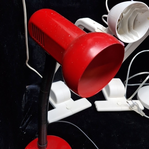 464 - A group of electric lights, including a red enamelled gooseneck desk lamp, 2 white adjustable reflec... 