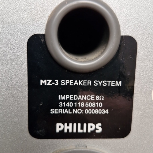 472 - A Philips compact micro hi-fi comprising a central CD receiver/amplifier unit with twin matching spe... 