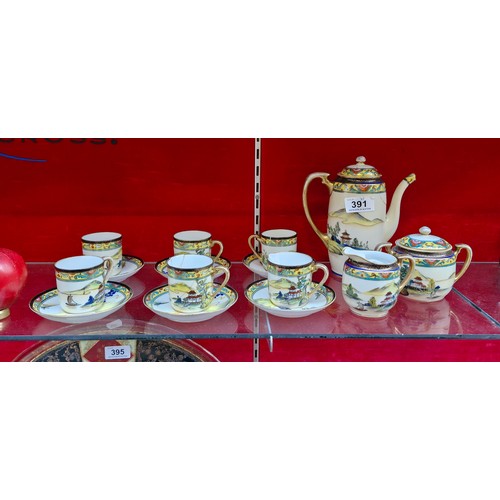 391 - A vintage Noritake porcelain tea / coffee set from Japan. Pieces feature hand painted and gilded wor... 