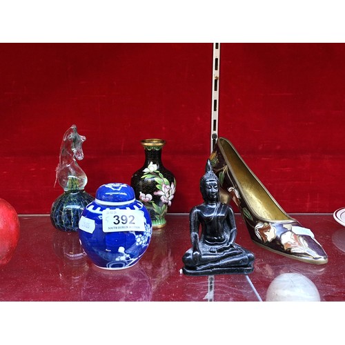 392 - A mixed selection of five items including a blue and whit lidded ginger jar, a heavy glass Madina se... 