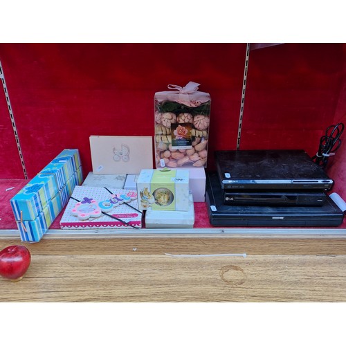 398 - A mixed lot of items including a brand new Wedgewood Christening Collection Peter Rabbit Cup, A Nost... 