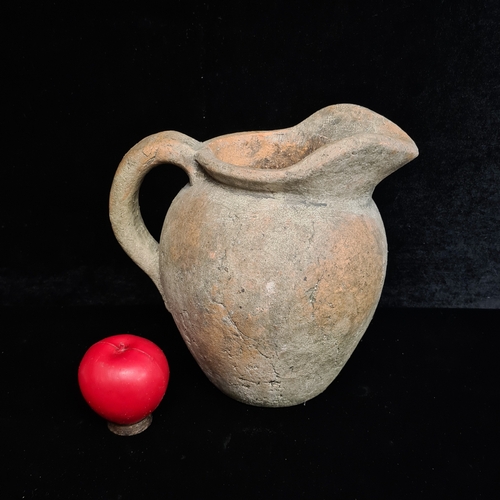 271 - A large and impressive vintage rustic terracotta water pitcher.