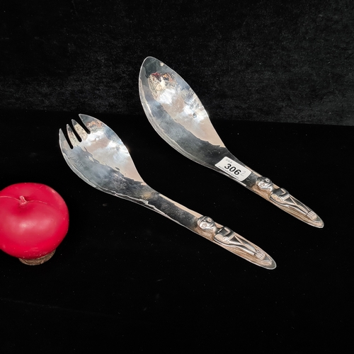 An elegant pair of vintage hammered silverplate Salad servers from