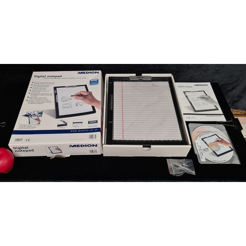 372 - A Medion digital notepad features 32MB internal memory, DIN A4 writing pad, wireless electronic pen