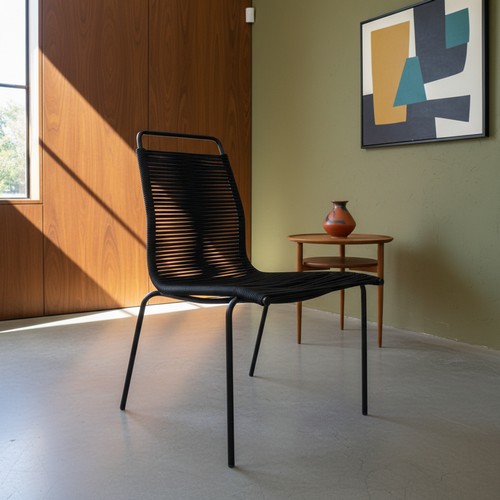 Star Lot : A mid century PK-2 chair in Black, Flatline by Poul Ktaerholm, One currently on Pamono for €334. Please note, the image of the modelled item was created by a new imaging/ staging software called showiton.ai. Upload a simple image of a piece of jewellery and the software stages it on a model for you. Paste the URL (showiton.ai) into your browser and try it for free. It’s a very simple, user-friendly platform.

Previous in auction on T120226  - 15/02/2026 with Lot no.980